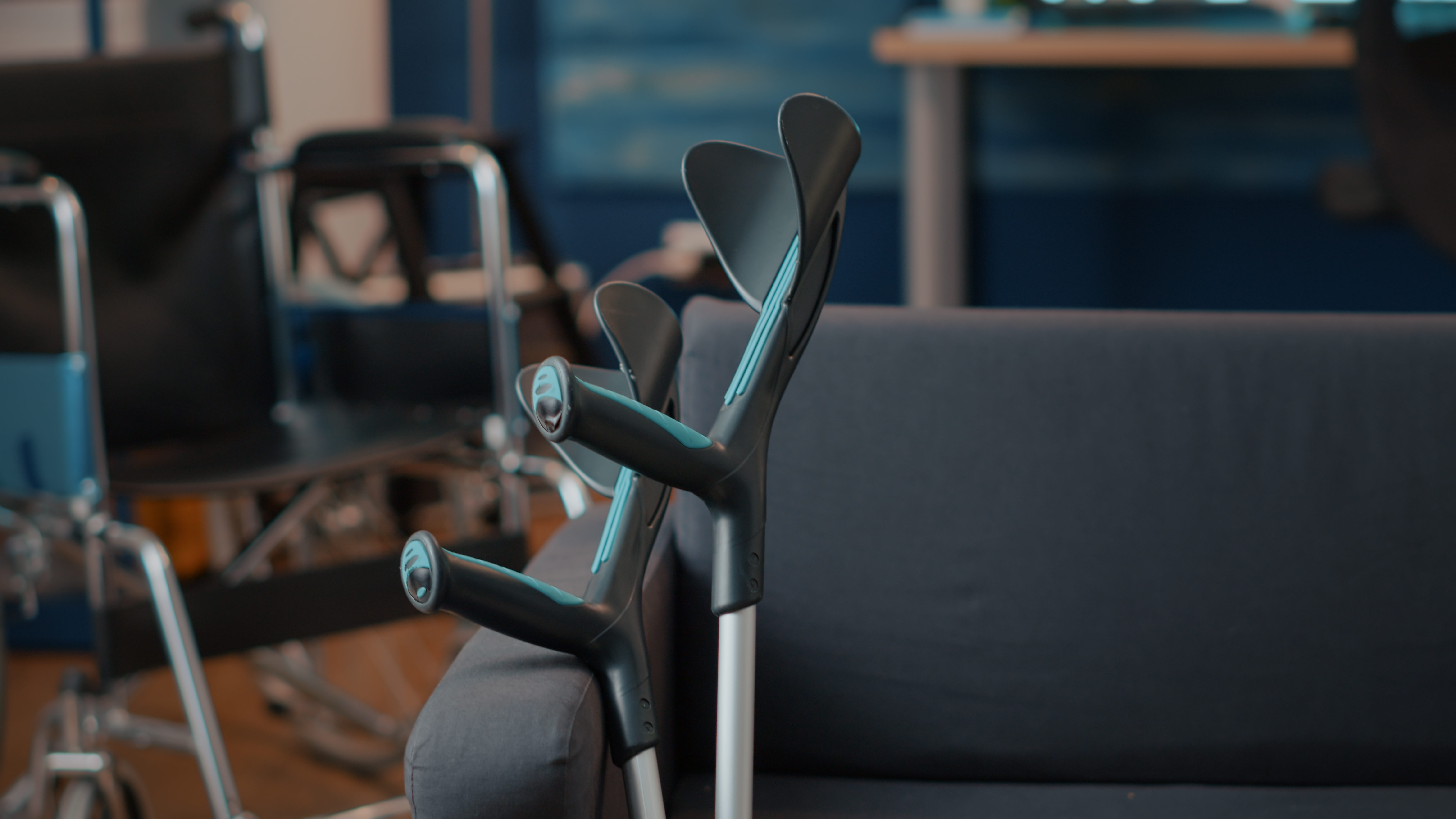 Crutches resting against a couch in a living room
