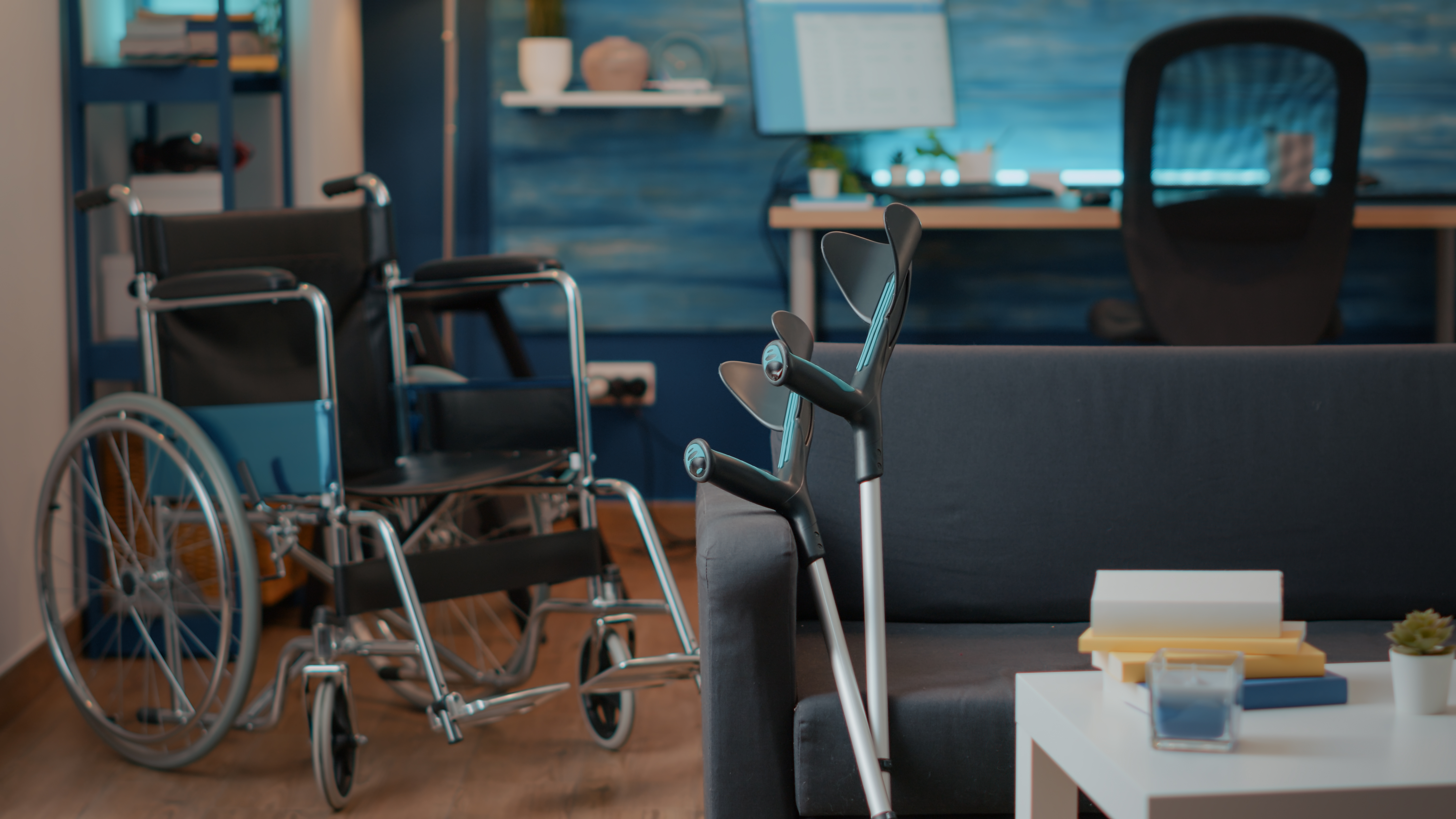 Wheelchair and crutches set up in a patient's living room